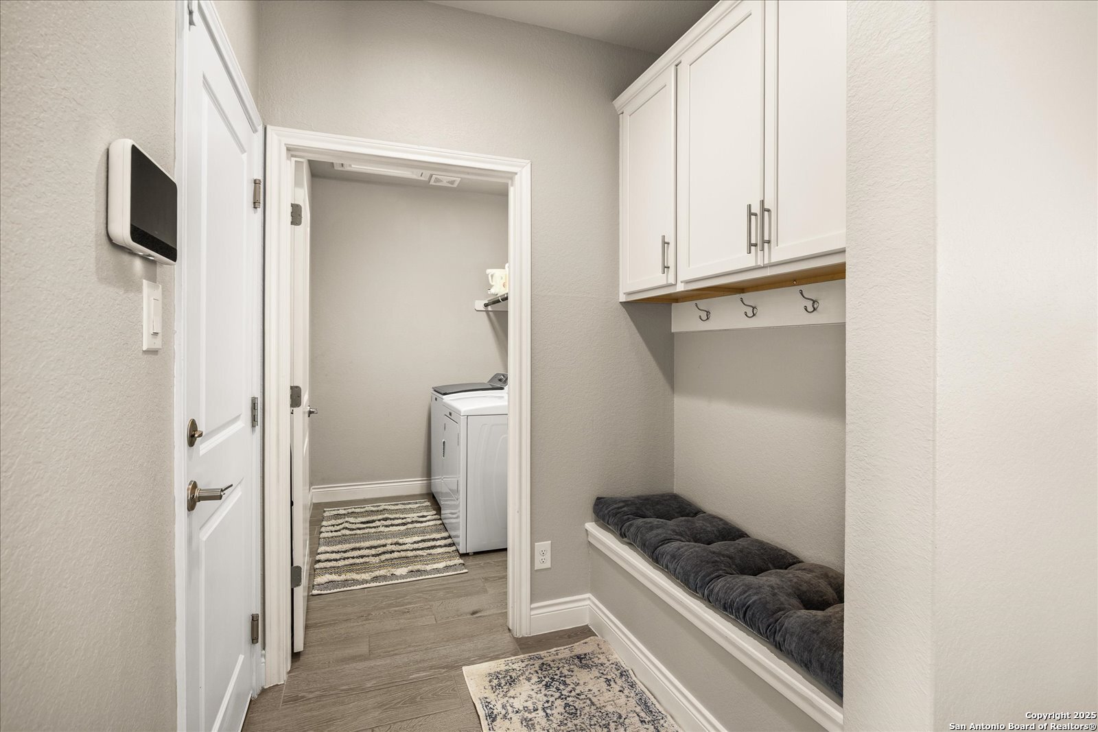 126 Ocotillo Boerne, TX 78006 - Photo 31 of 47 a bathroom with a granite countertop sink and refrigerator