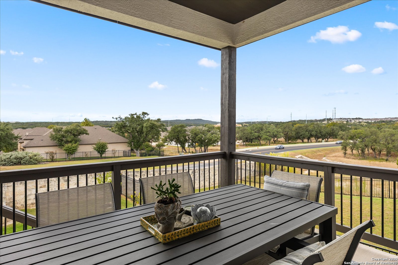 126 Ocotillo Boerne, TX 78006 - Photo 36 of 47 a view of a balcony with wooden floor and fence