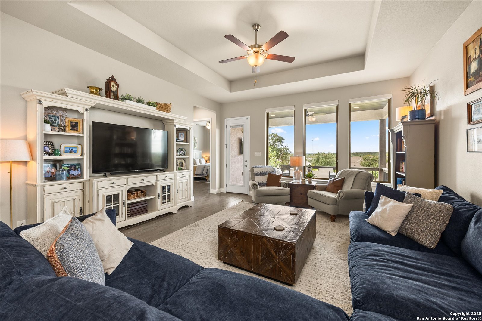 126 Ocotillo Boerne, TX 78006 - Photo 10 of 47 a living room with furniture and a flat screen tv
