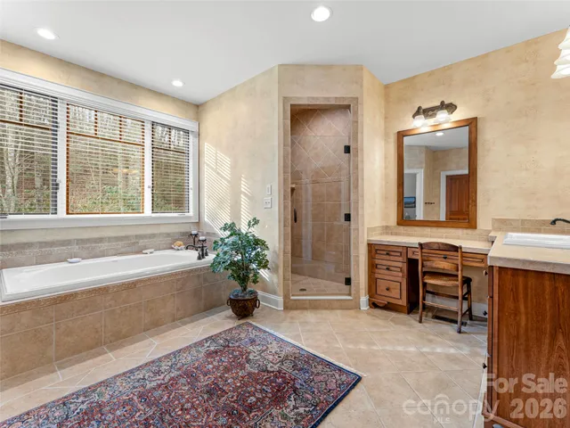 a view of hall way with furniture