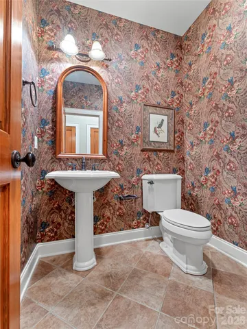 en empty room with large windows