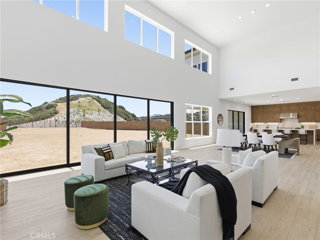 11850 Red Hawk Lane Porter Ranch, CA 91326 - Photo 5 of 51 Great Room: Fernwood Italianate - The Ridge Collection at Bella Vista - Homesite 68