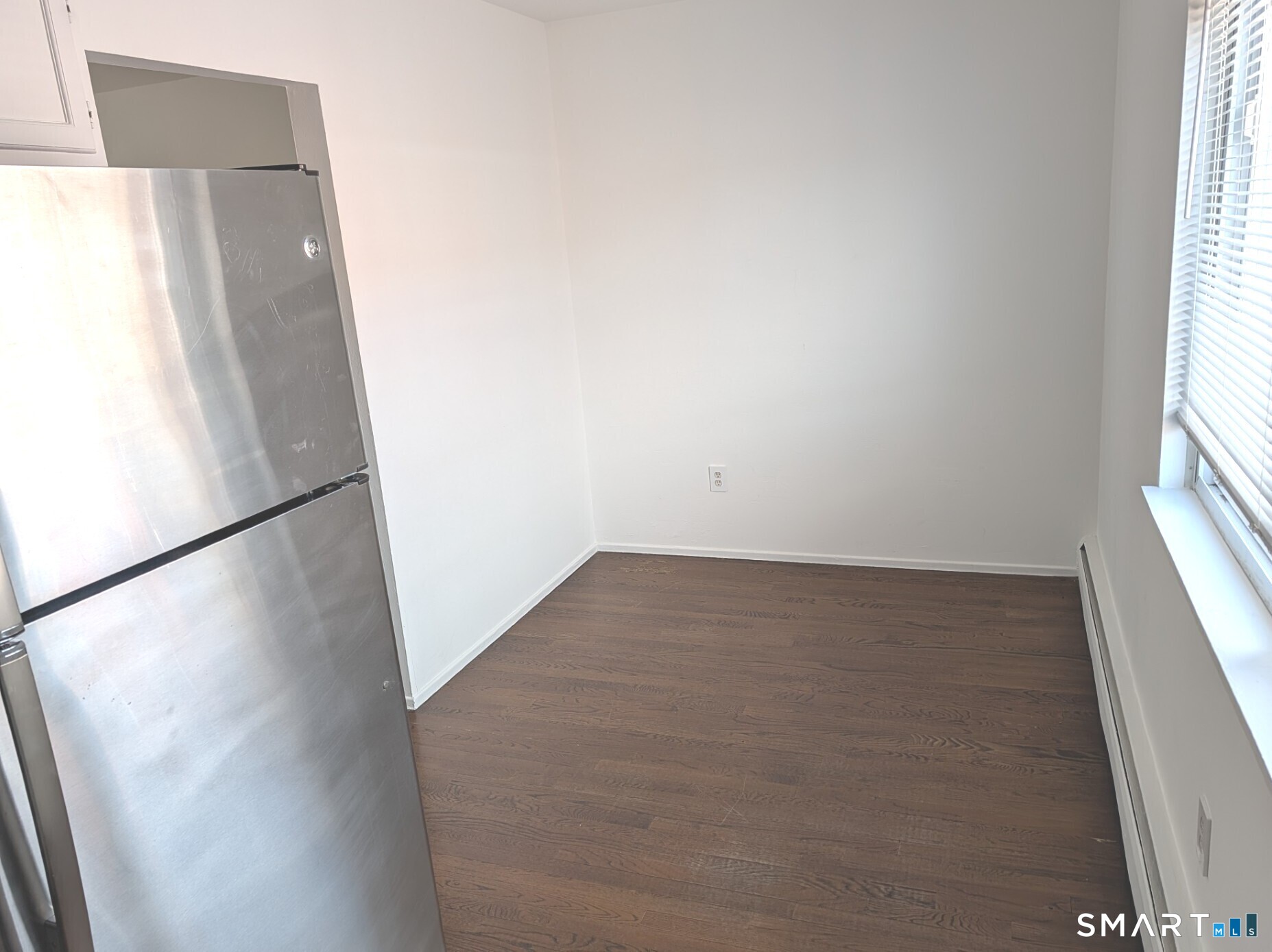 18 Prospect Street, Unit C10 Norwalk, CT 06850 - Photo 6 of 11 an empty room with a window