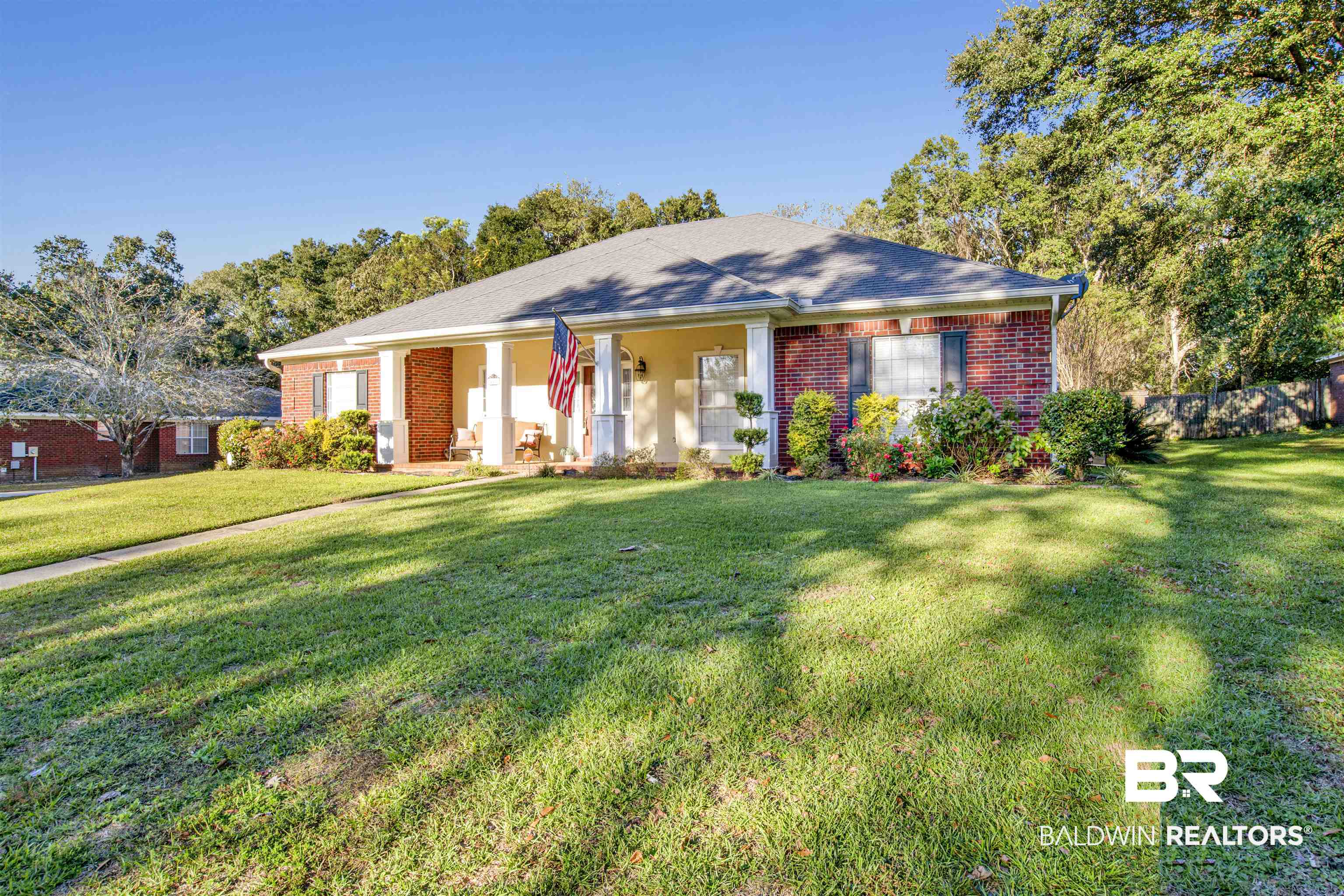 445 Wedgefield Drive South Mobile, AL 36608 - Photo 31 of 36 Single story home featuring a porch and a front yard