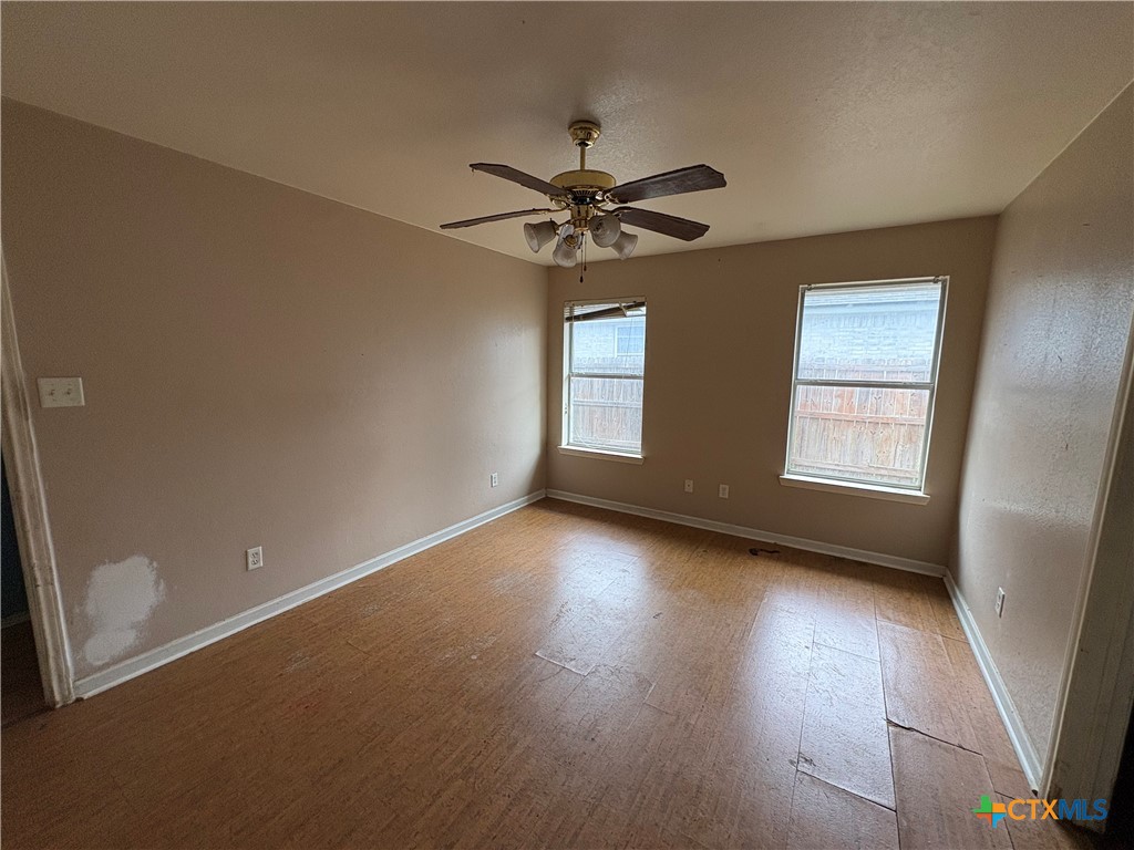206 Timber Ridge Drive Nolanville, TX 76559 - Photo 9 of 21 a view of a livingroom with a ceiling fan and window