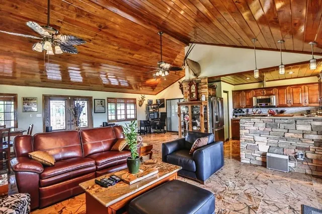 a bed room with a bed and a large mirror