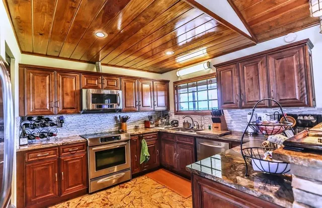 a bathroom with a toilet and shower