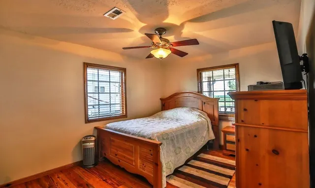 a view of yard with tree in back