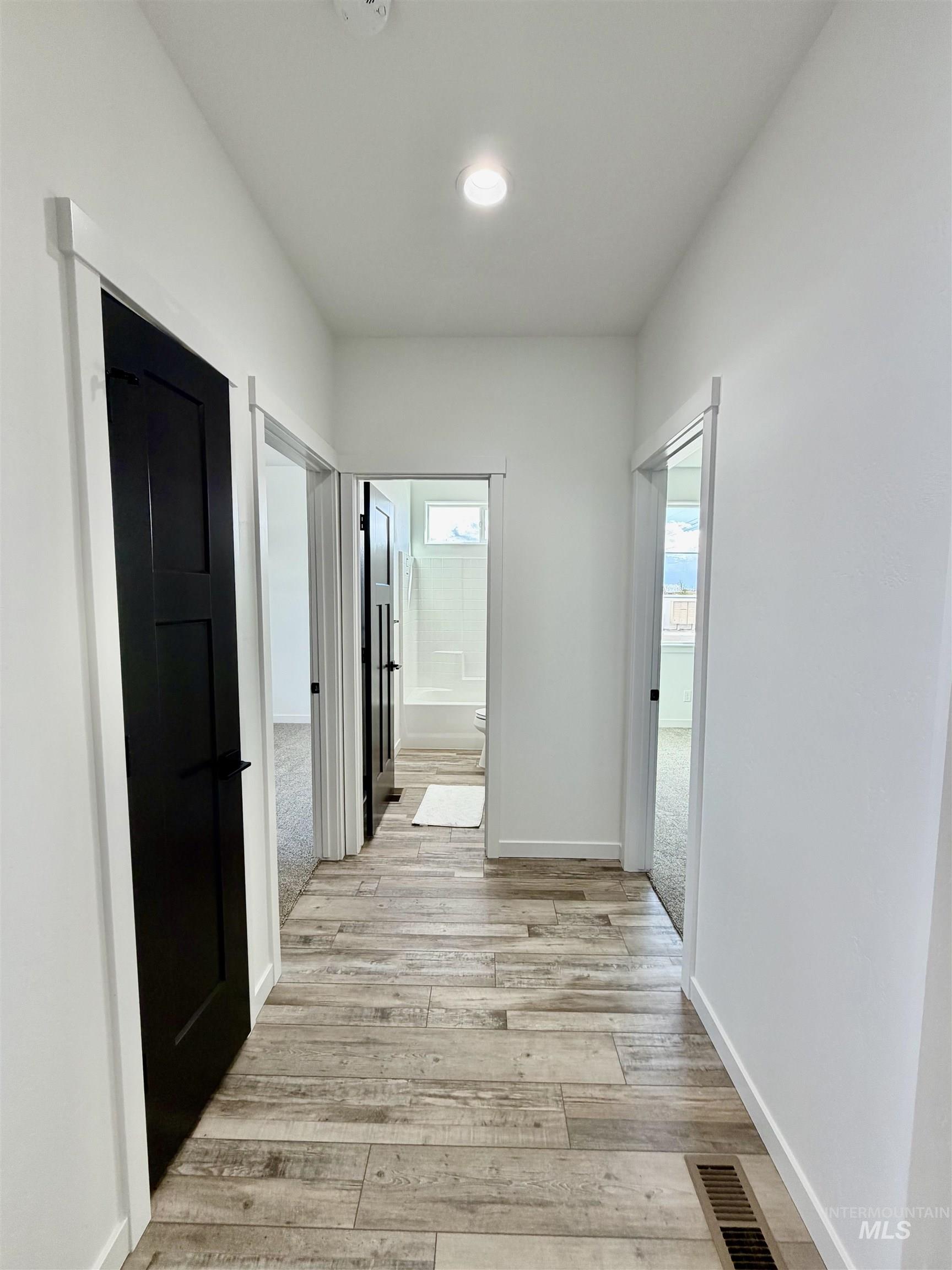 1419 Topaz Rupert, ID 83350 - Photo 27 of 41 Hall featuring light wood finished floors and baseboards