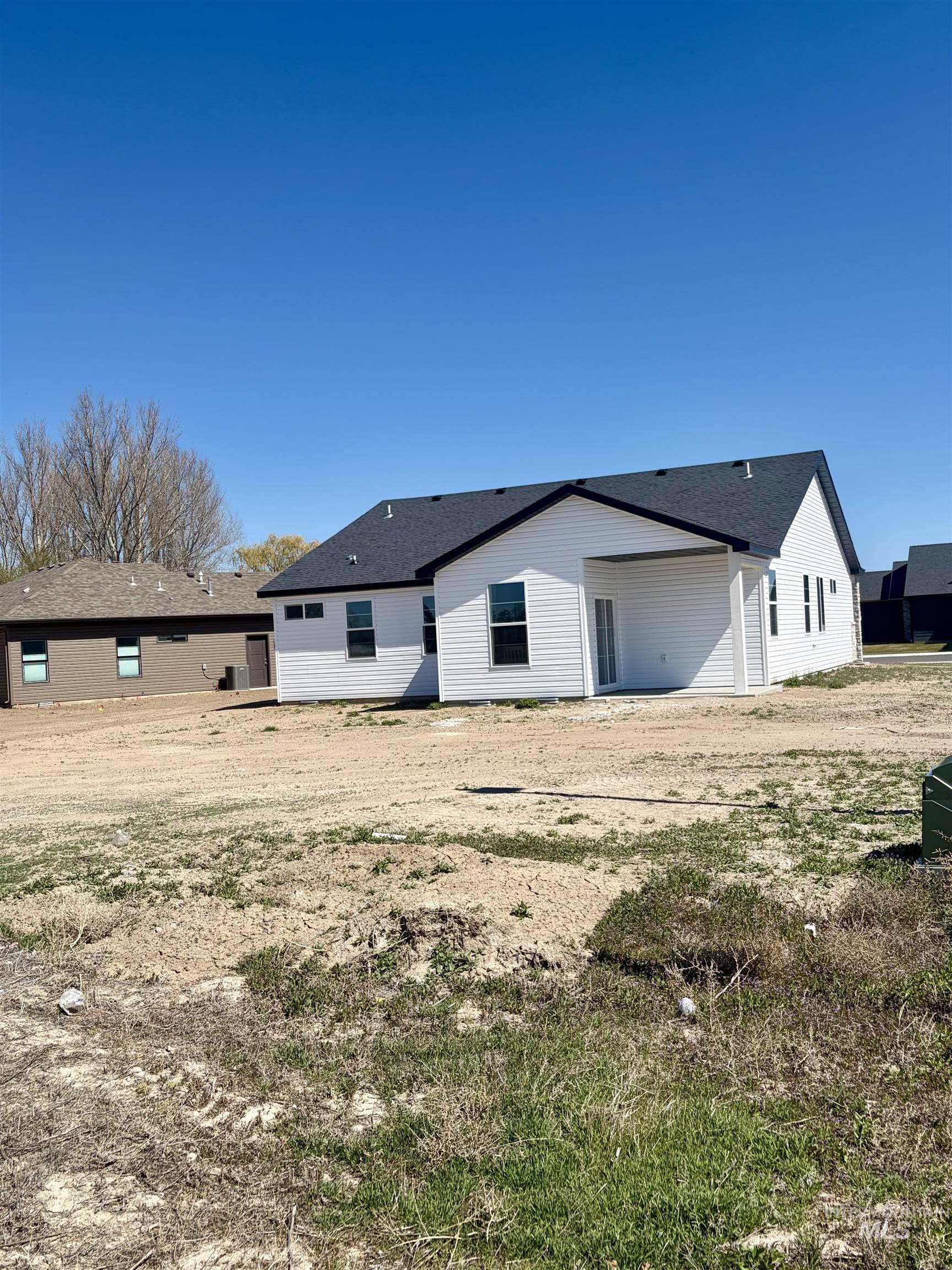 1419 Topaz Rupert, ID 83350 - Photo 36 of 41 Rear view of property featuring a patio
