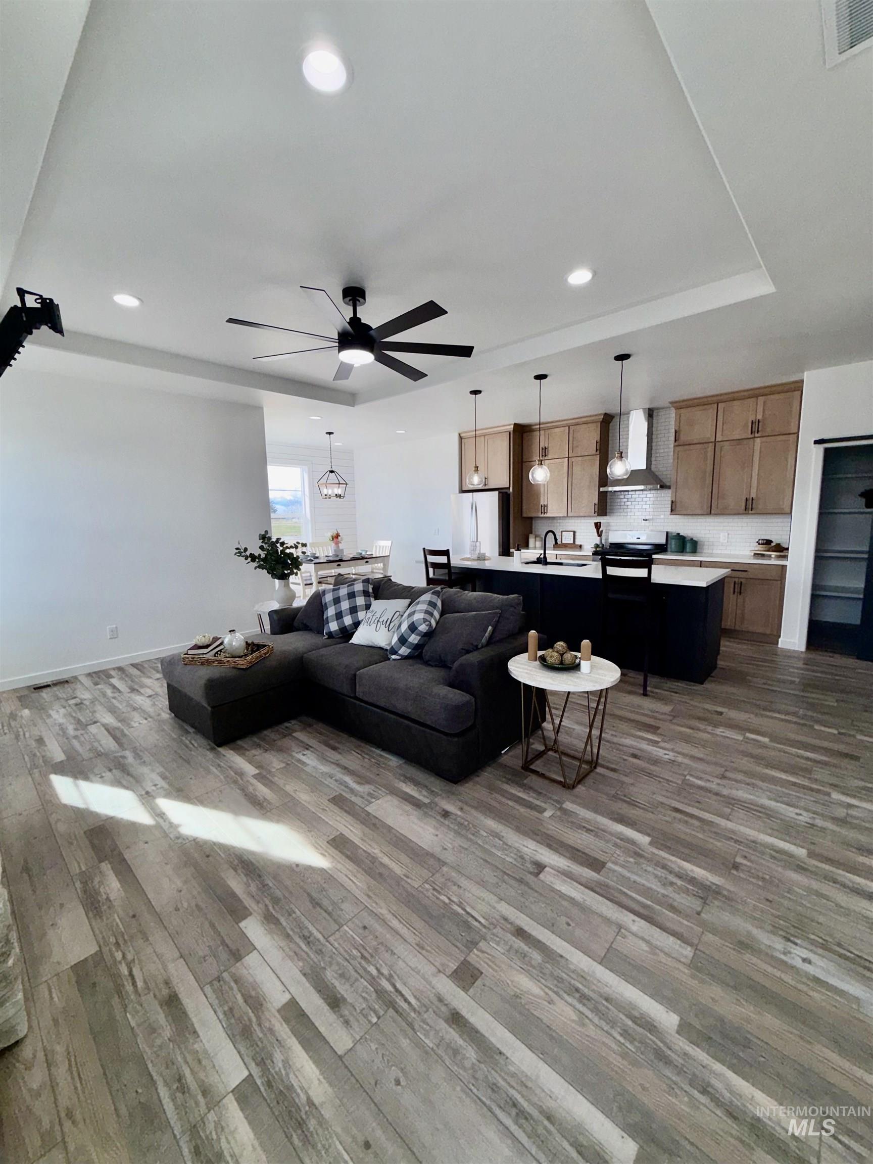1419 Topaz Rupert, ID 83350 - Photo 5 of 41 Living room with ceiling fan, light wood-style flooring, and recessed lighting