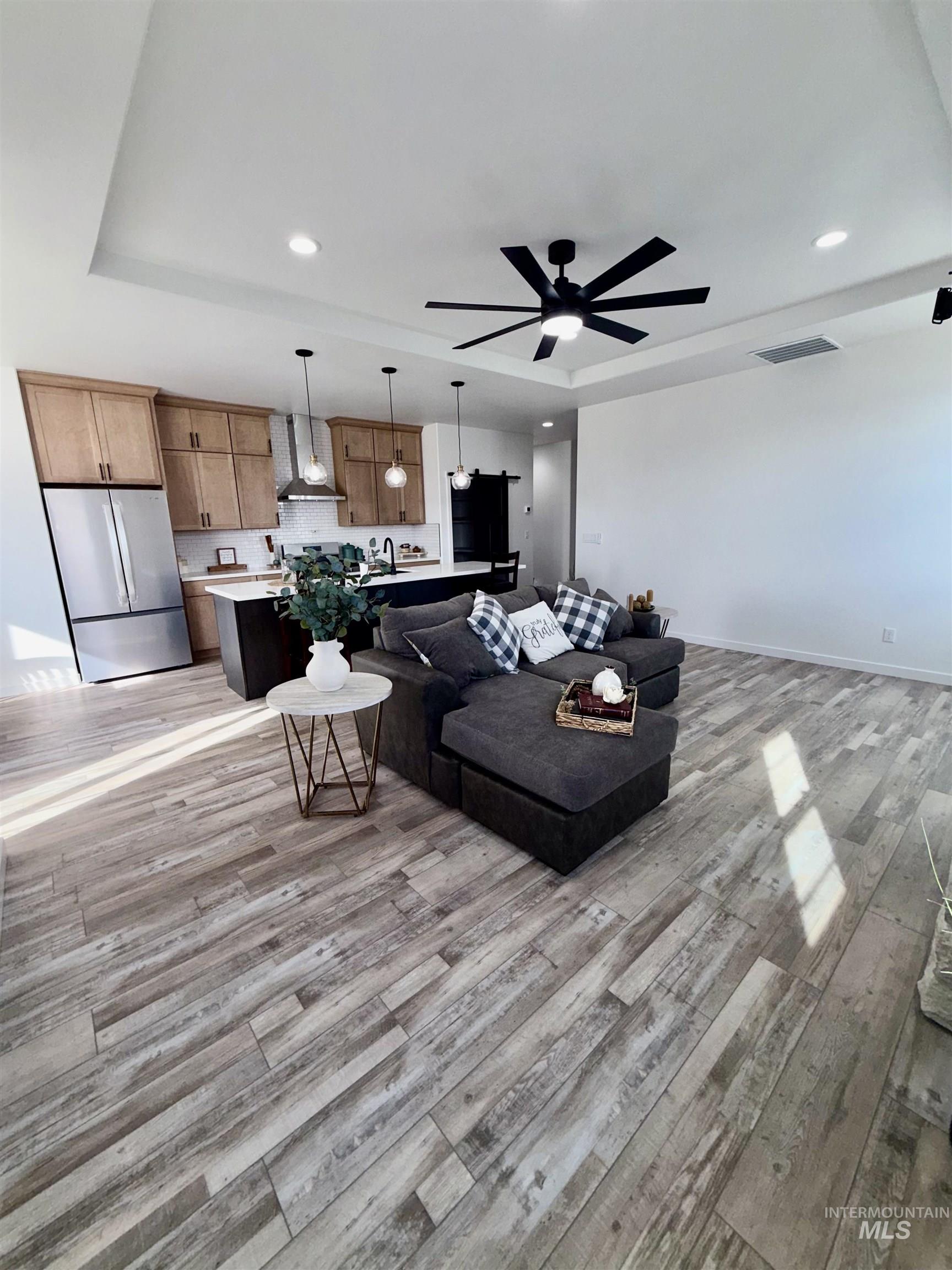 1419 Topaz Rupert, ID 83350 - Photo 6 of 41 Living area with a ceiling fan, light wood-type flooring, and recessed lighting