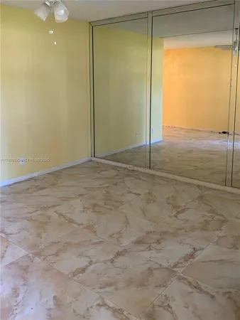 a view of a room with an empty space