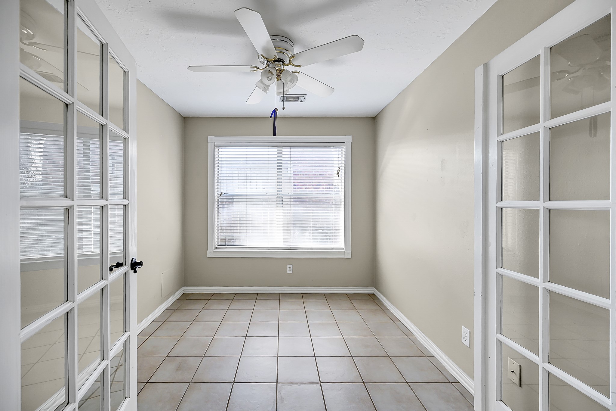 222 Lazy Lane Montgomery, TX 77356 - Photo 9 of 18 a view of an empty room with a window
