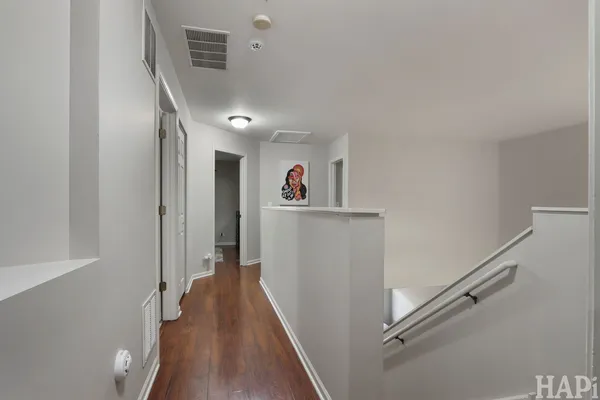 a view of a hallway with closet