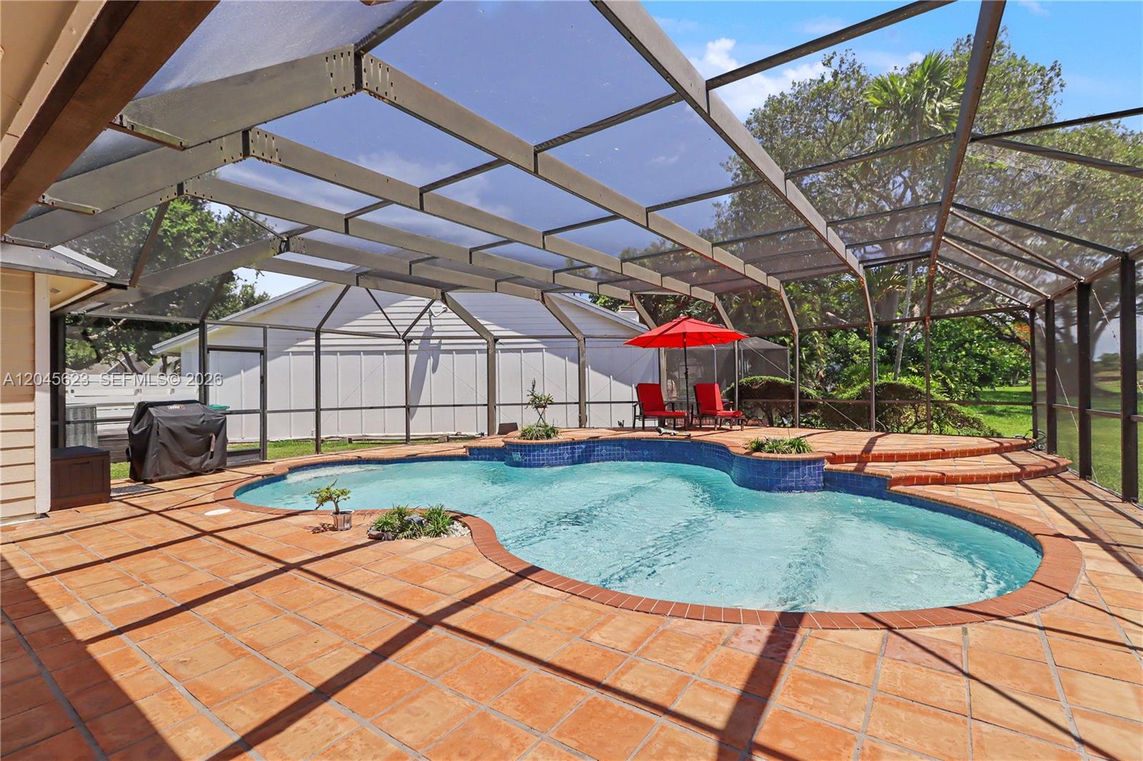 14958 Southwest 143rd Place Miami, FL 33186 - Photo 2 of 50