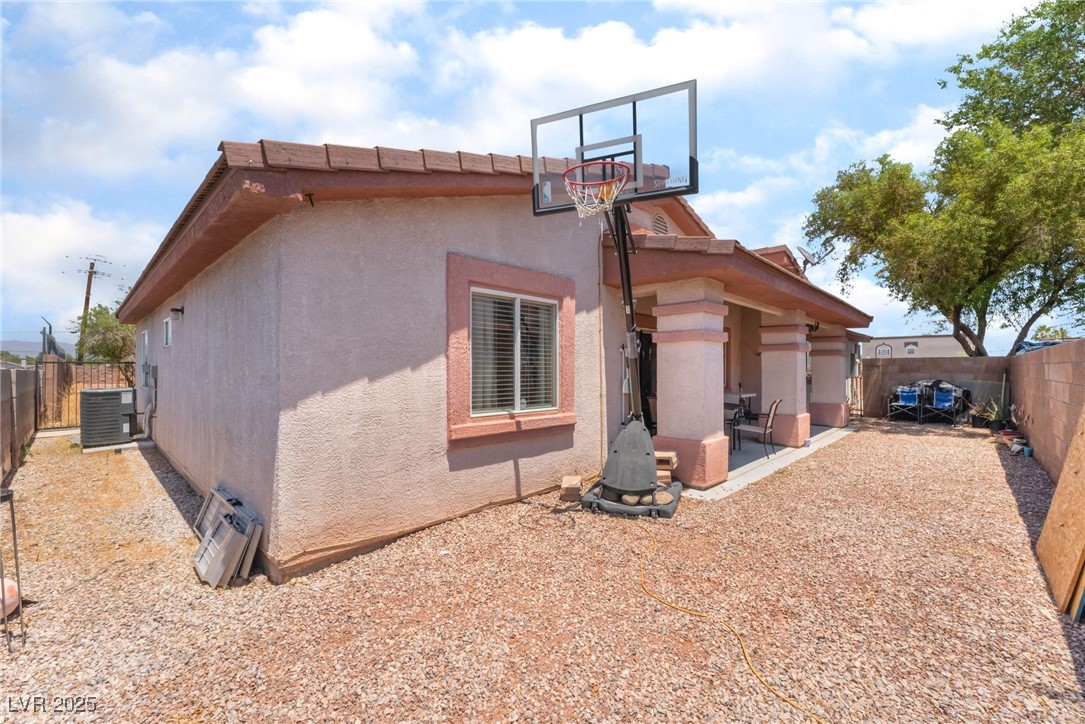 4656 East Desert Inn Road Las Vegas, NV 89121 - Photo 96 of 98 4654 E DI Rear view of property featuring a fenced backyard and stucco siding
