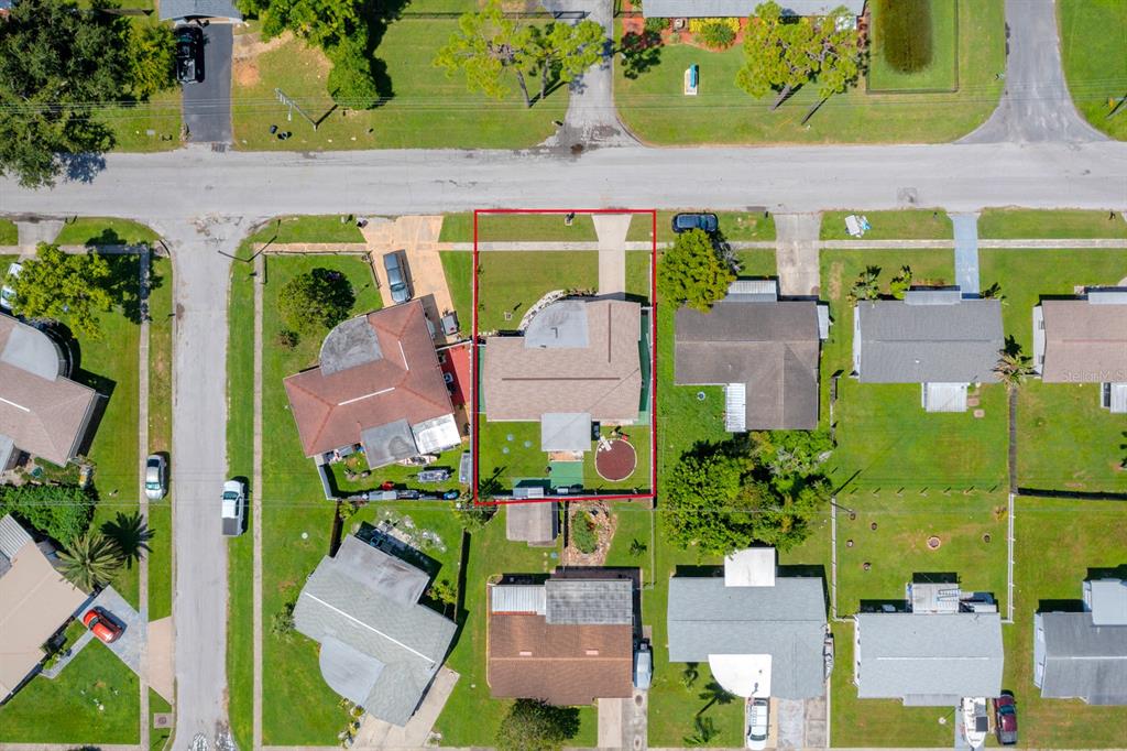 2152 Arcadia Road Holiday, FL 34690 - Photo 27 of 30 an aerial view of a houses with yard