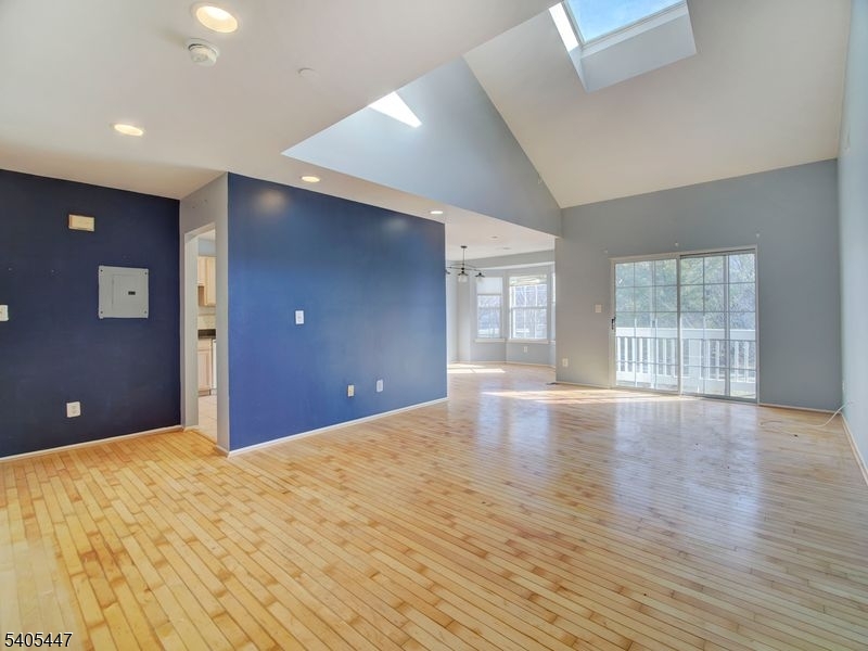 30 Pasture Court Ledgewood, NJ 07852 - Photo 11 of 24 a view of an empty room with wooden floor and a window