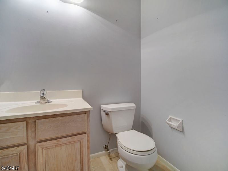 30 Pasture Court Ledgewood, NJ 07852 - Photo 17 of 24 a bathroom with a toilet a sink and mirror