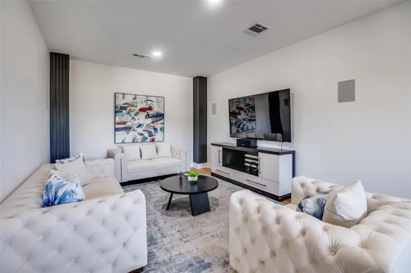 a bedroom with furniture and a bed