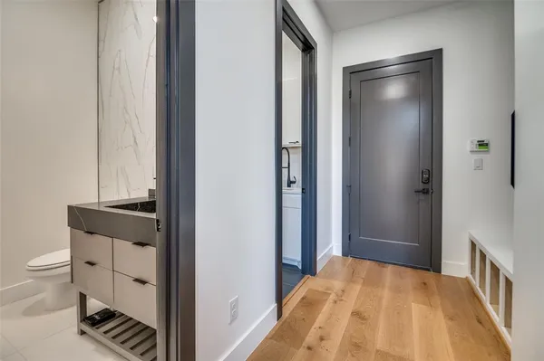a view of a bedroom from a hallway