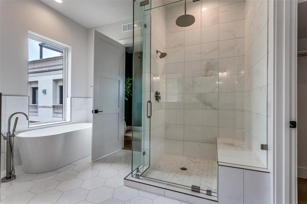 250 East Dallas Road, Unit 121 Grapevine, TX 76051 - Photo 25 of 34 a bathroom with a bathtub and a shower