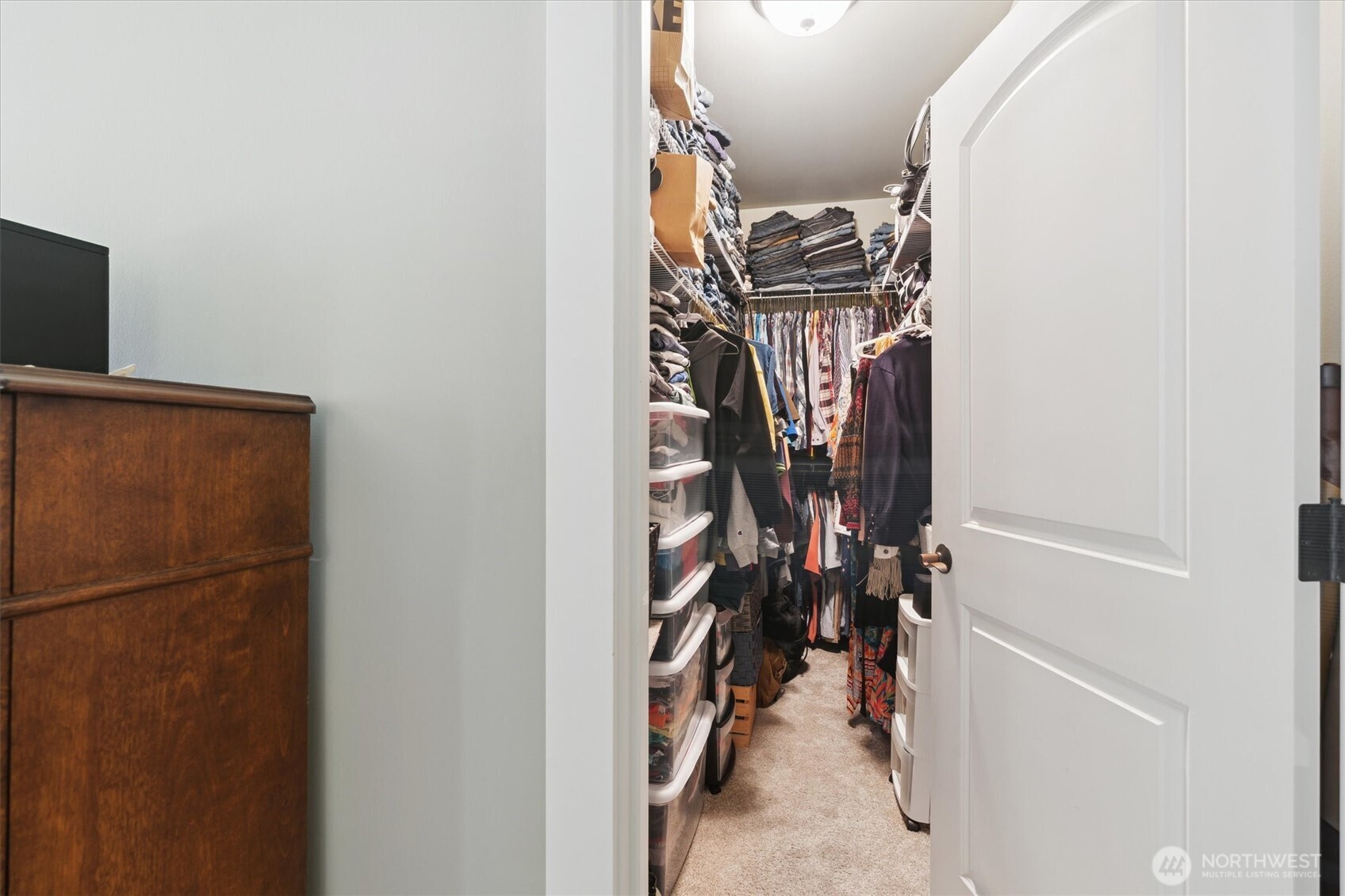 26713 178th Loop Southeast Covington, WA 98042 - Photo 14 of 30 a view of a closet with storage