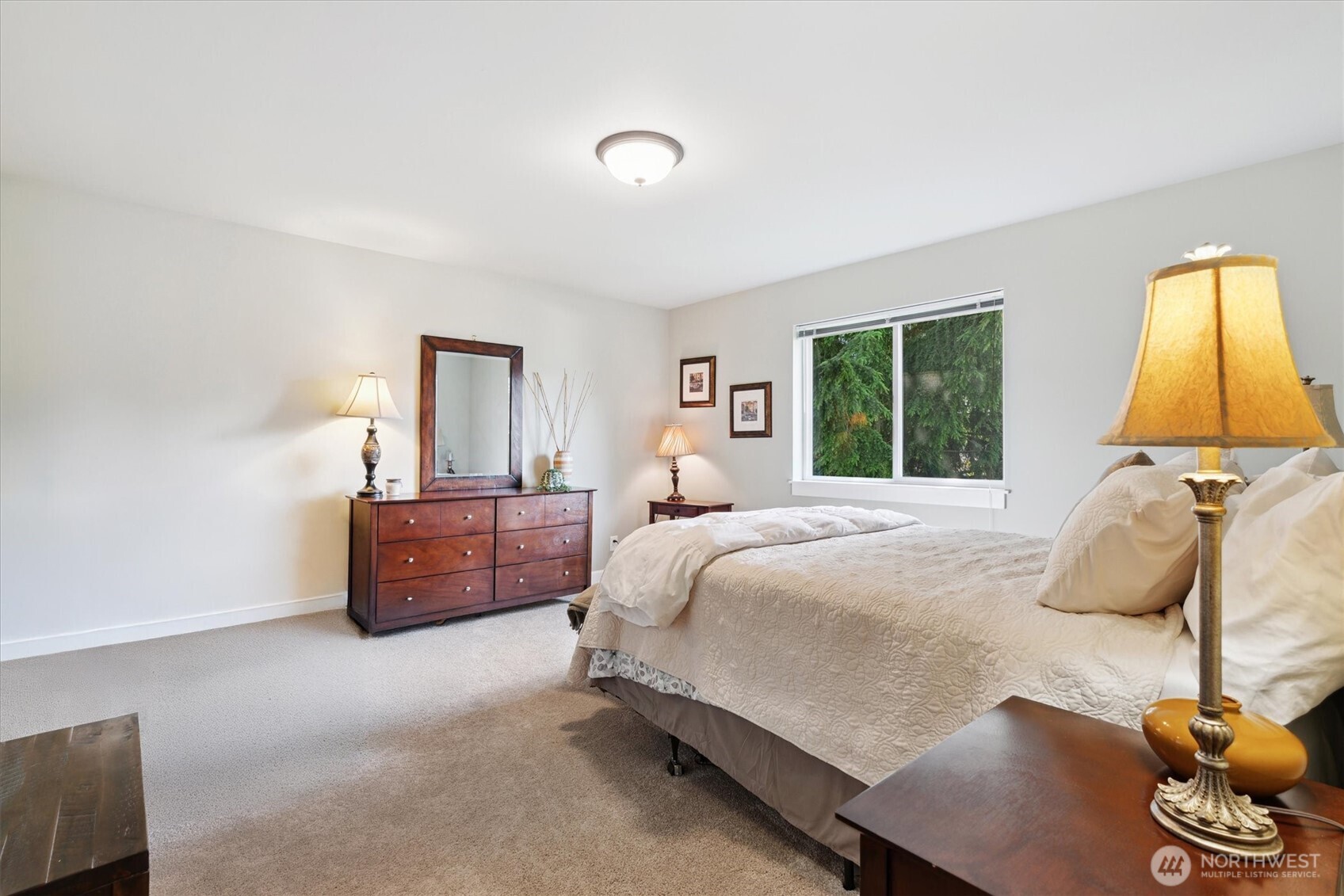 26713 178th Loop Southeast Covington, WA 98042 - Photo 18 of 30 a bedroom with a bed and a window