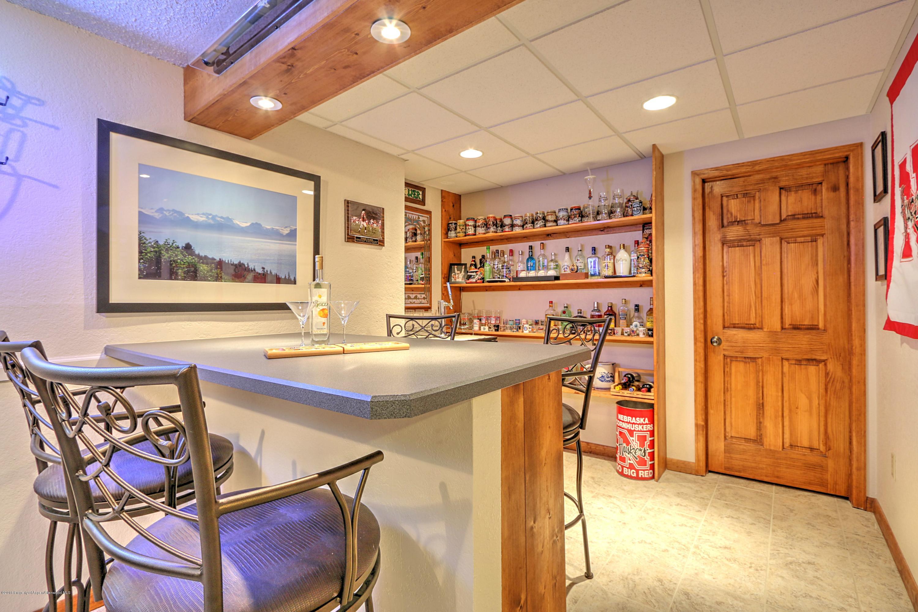 693 Mesa Avenue Rifle, CO 81650 - Photo 18 of 27 Family Room - Bar Area