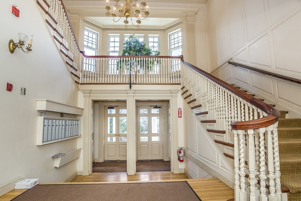 100 Pond Street, Unit 6 Boston, MA 02130 - Photo 3 of 29 a view of entryway and hall with wooden floor