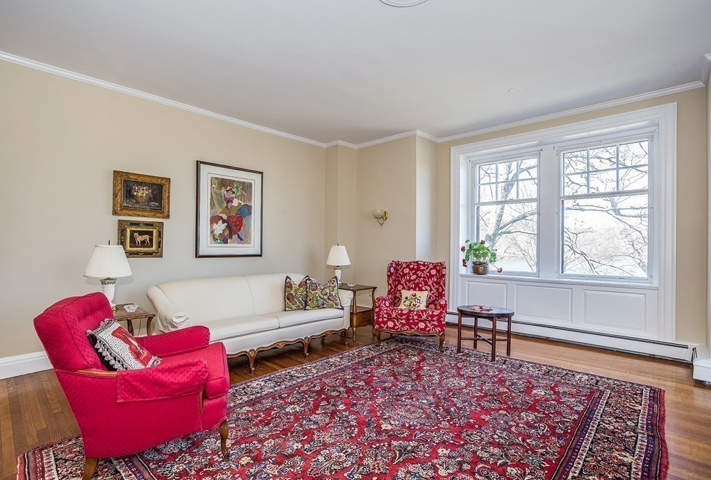 100 Pond Street, Unit 6 Boston, MA 02130 - Photo 5 of 29 a living room with furniture and a rug