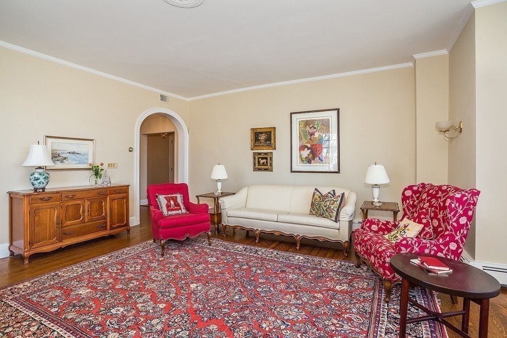 100 Pond Street, Unit 6 Boston, MA 02130 - Photo 6 of 29 a living room with furniture and a rug