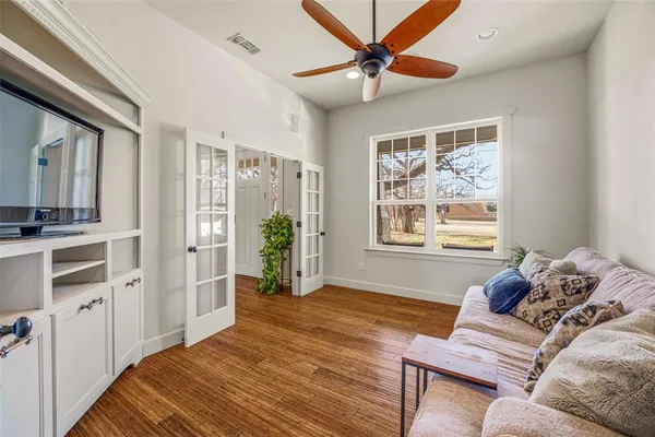 a bedroom with a bed furniture and a window
