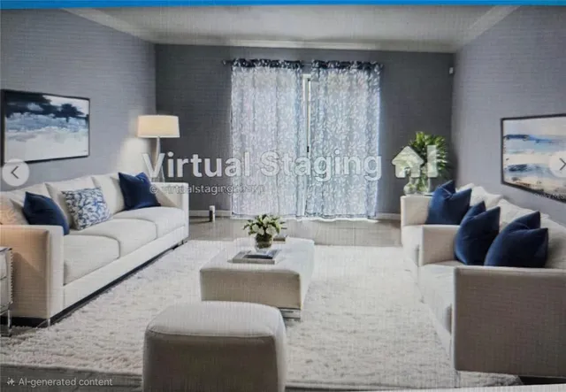 a living room with furniture and a potted plant