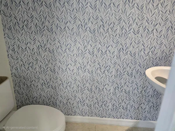 a bathroom with a toilet and a sink