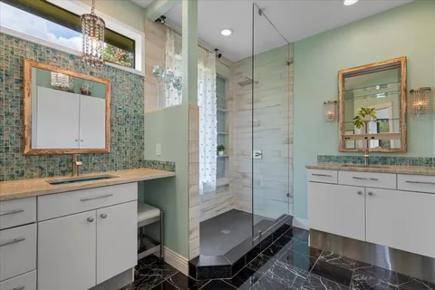 a bathroom with a sink and a mirror