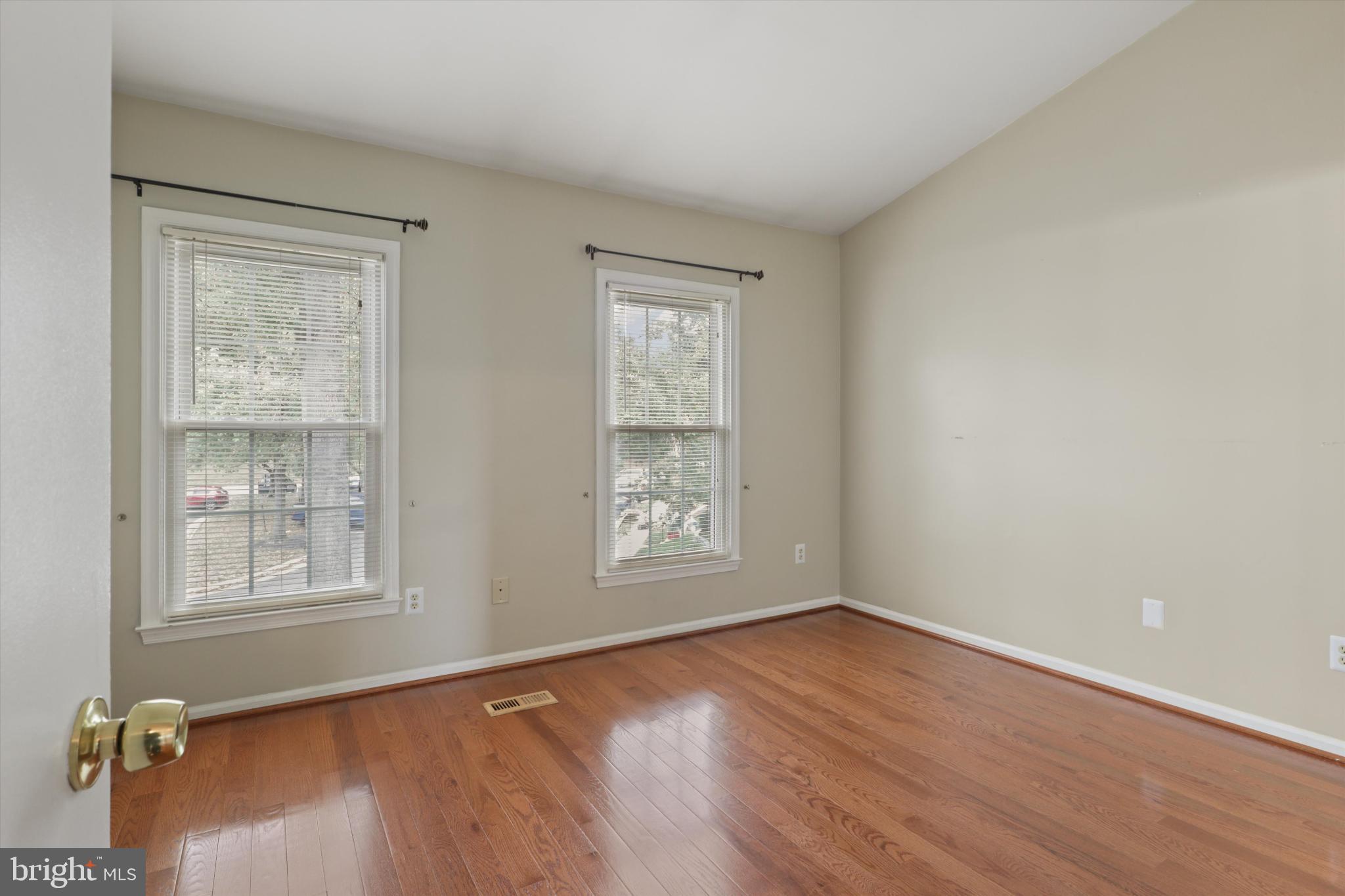 8564 Springfield Oaks Drive Springfield, VA 22153 - Photo 13 of 28 an empty room with windows