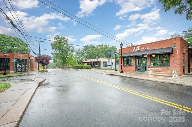 a view of a building with a street