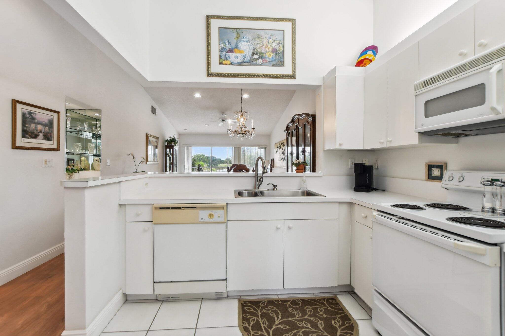 400 Northwest 67th Street, Unit 207 Boca Raton, FL 33487 - Photo 14 of 46 Kitchen
