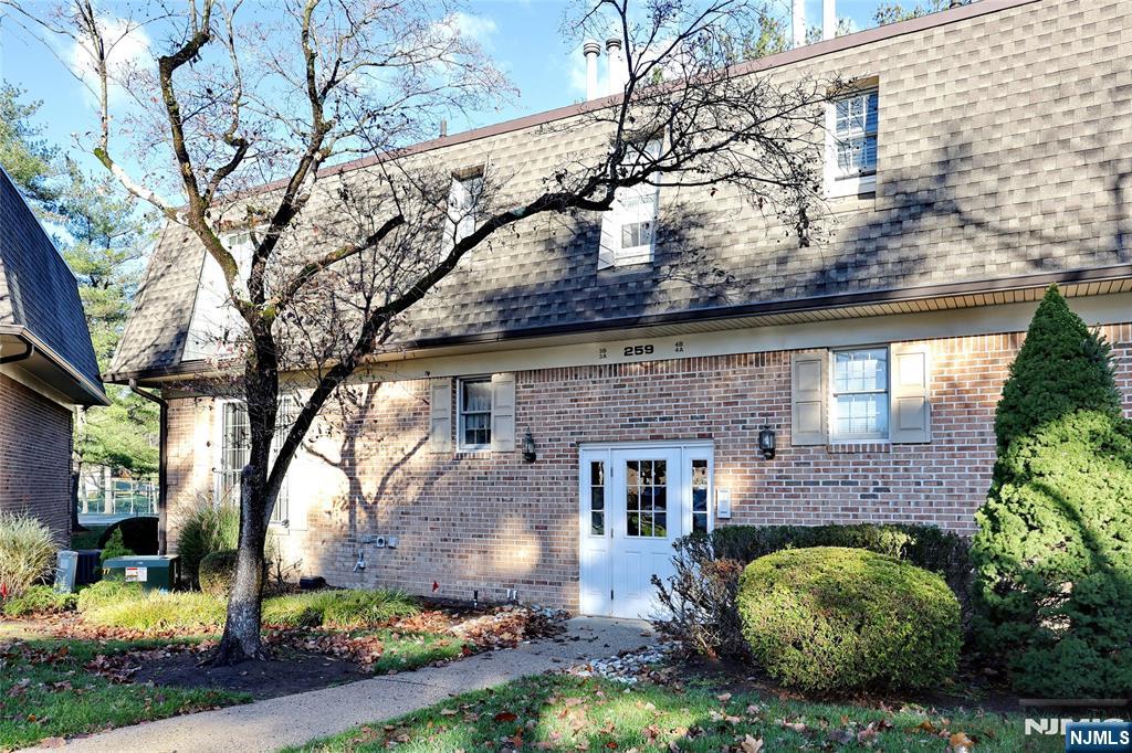 a front view of house with yard