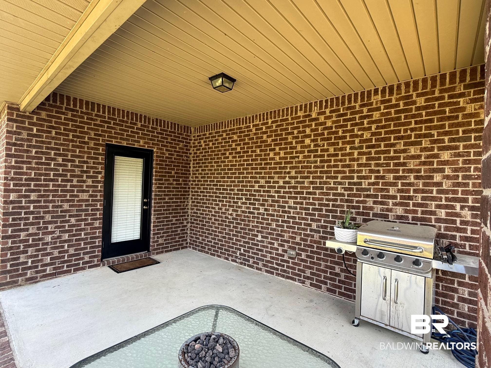 2996 Notsram Court Mobile, AL 36695 - Photo 13 of 16 View of patio / terrace featuring a grill
