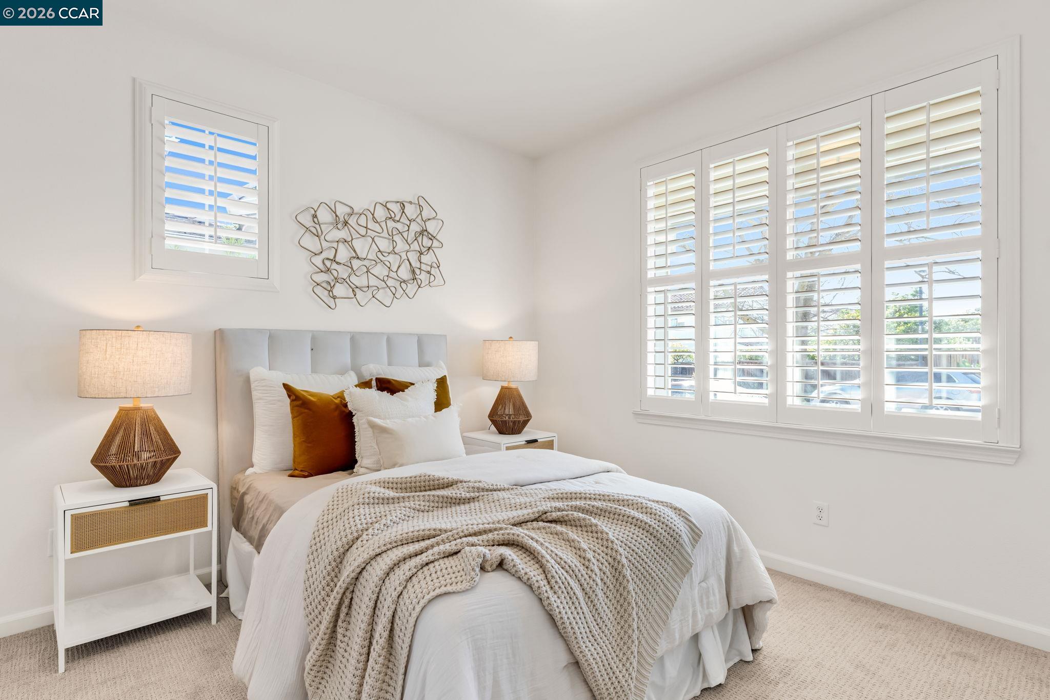 116 Spalding Court San Ramon, CA 94582 - Photo 24 of 59 a bedroom with a bed and a window