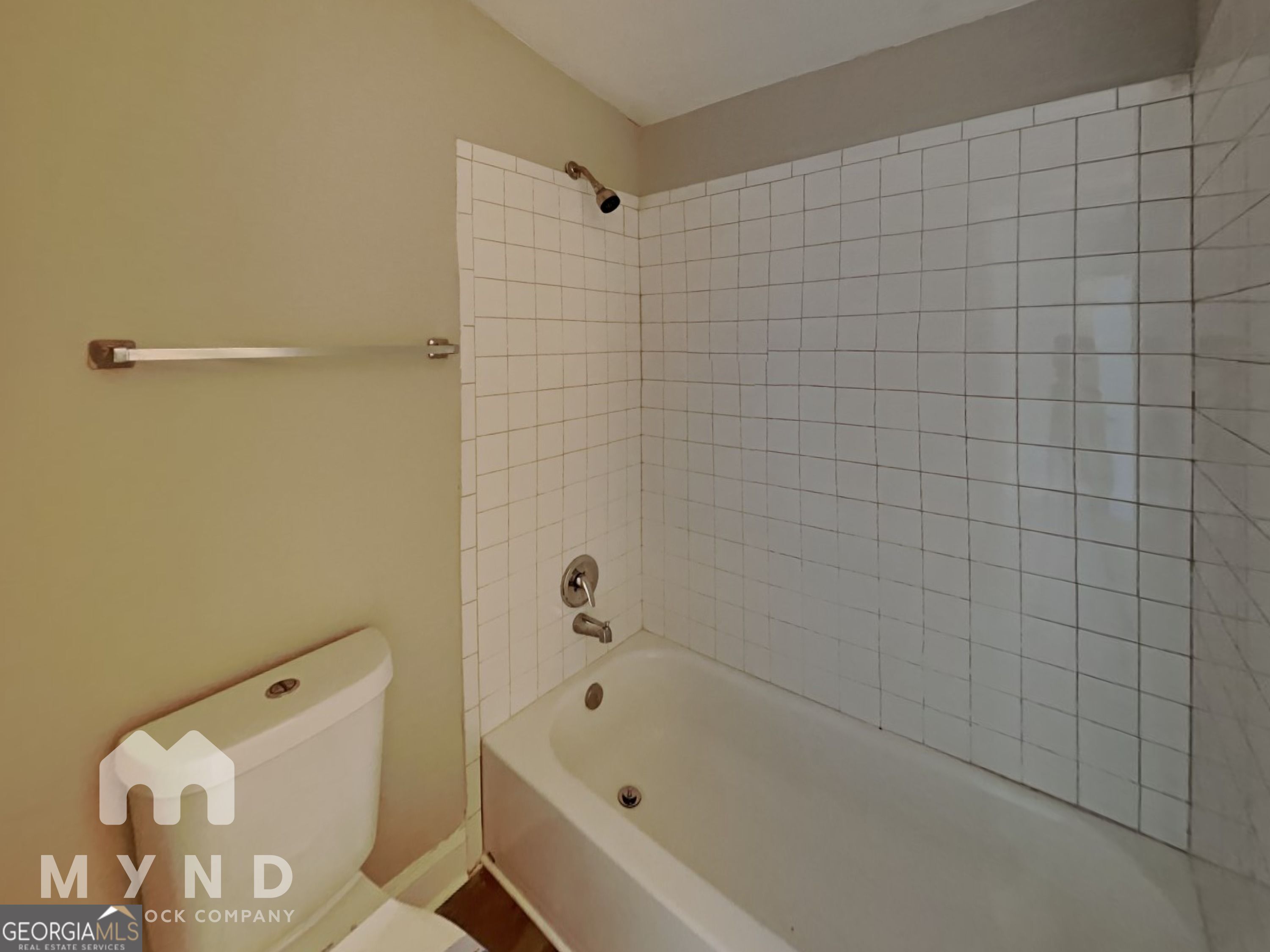 1708 Evans Drive Southwest Atlanta, GA 30310 - Photo 12 of 14 a bathroom with a bathtub and shower