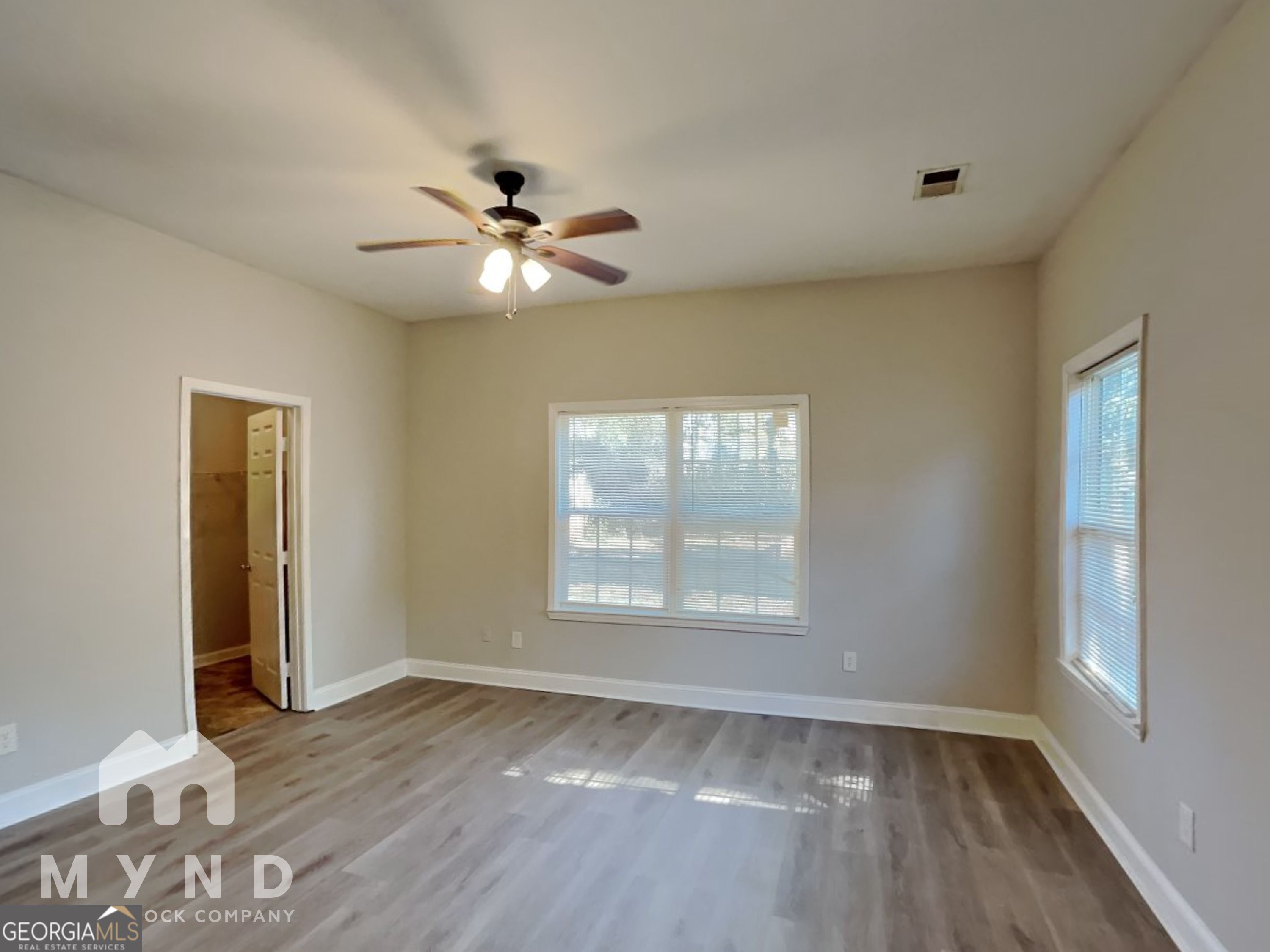 1708 Evans Drive Southwest Atlanta, GA 30310 - Photo 4 of 14 a view of empty room with wooden floor and fan