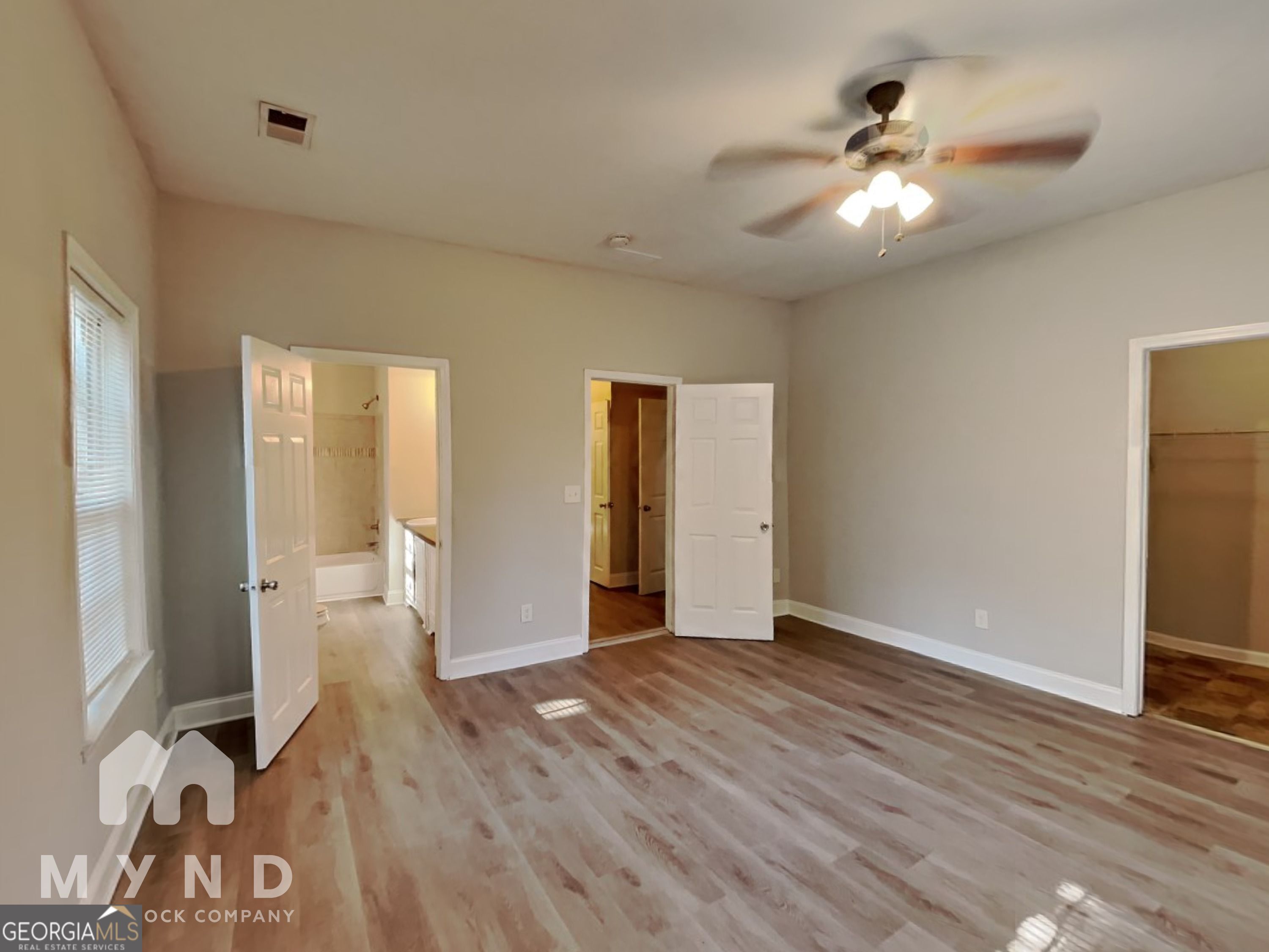 1708 Evans Drive Southwest Atlanta, GA 30310 - Photo 6 of 14 a view of an empty room with wooden floor