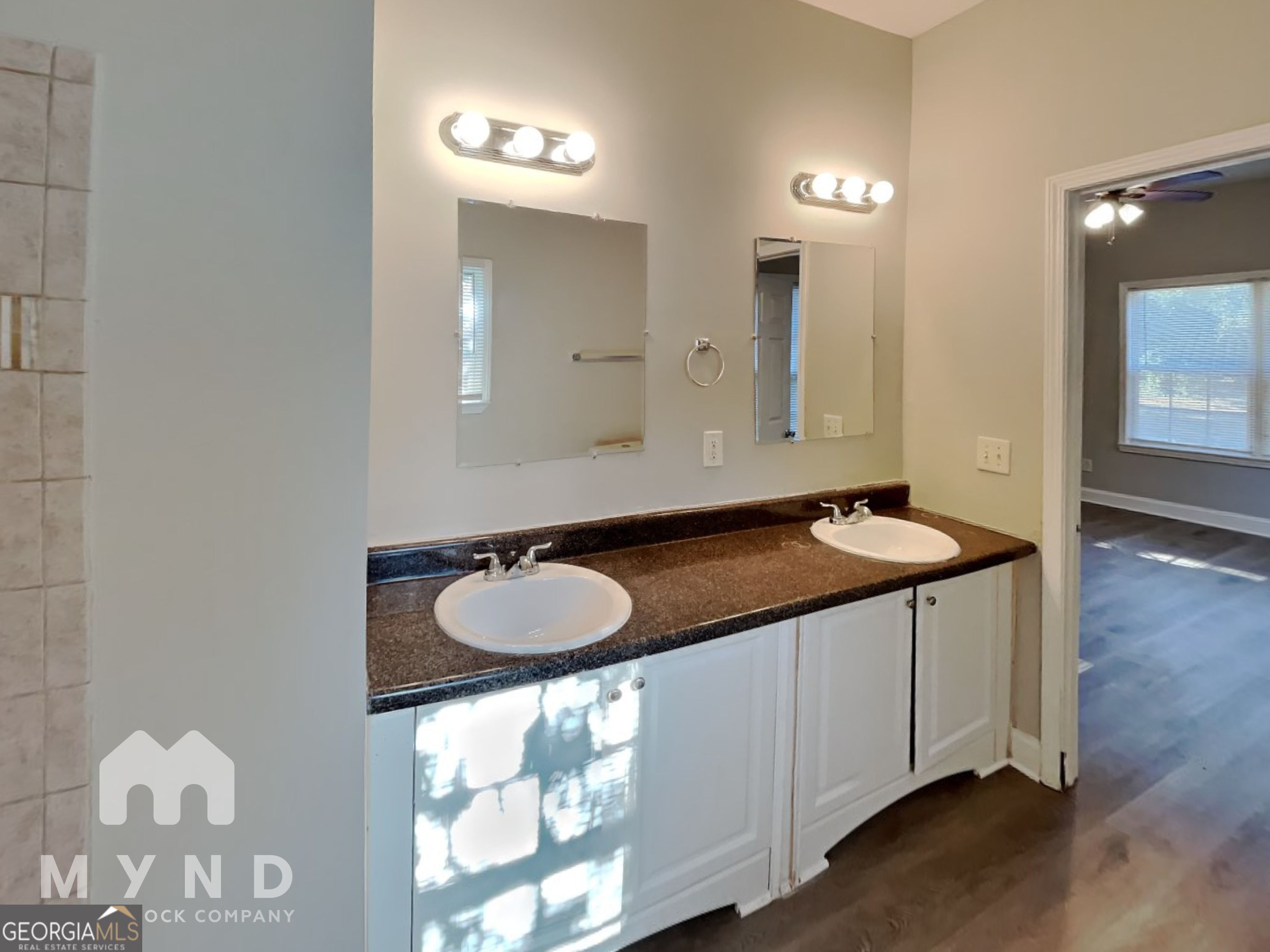 1708 Evans Drive Southwest Atlanta, GA 30310 - Photo 7 of 14 a bathroom with a sink and a mirror