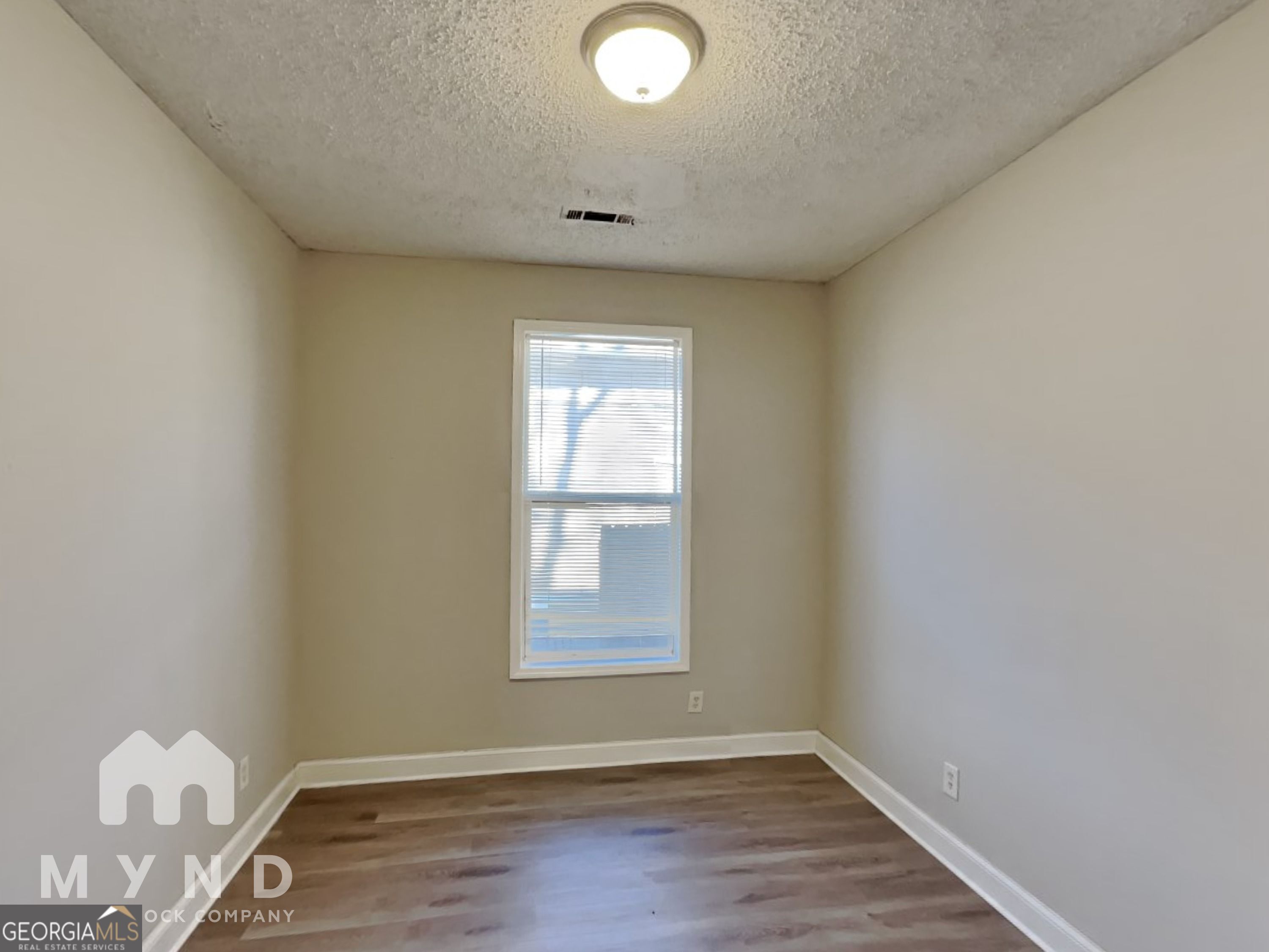 1708 Evans Drive Southwest Atlanta, GA 30310 - Photo 9 of 14 an empty room with a window