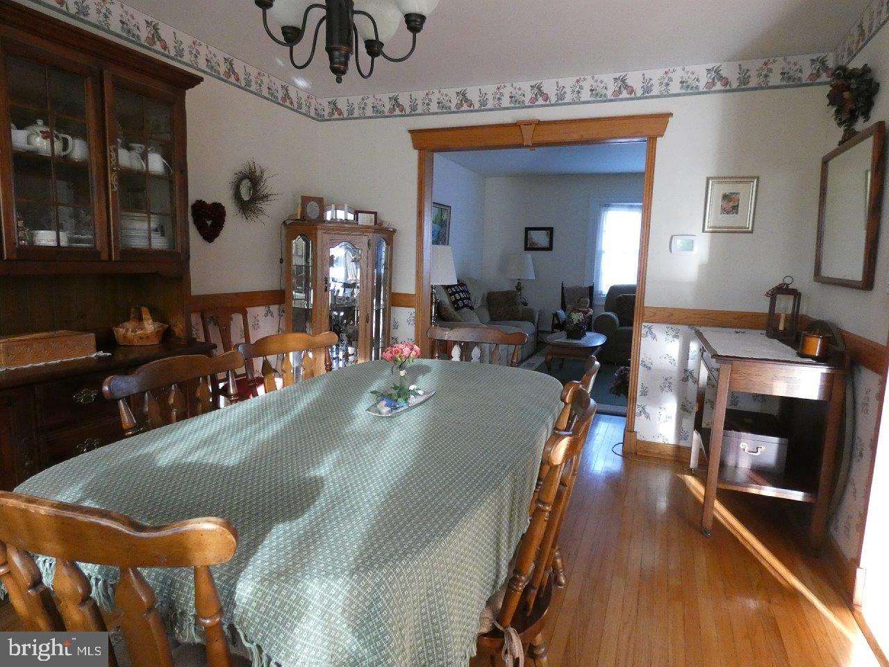 911 Lavera Road Warminster, PA 18974 - Photo 5 of 33 Large dining room features a lovely chandelier.