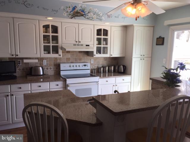 911 Lavera Road Warminster, PA 18974 - Photo 8 of 33 Beautiful white cabinetry makes the kitchen bright